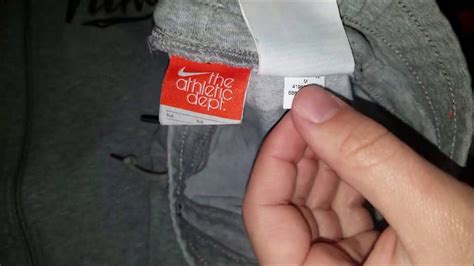 how to tell if a nike item is fake|nike jersey authentic code check.